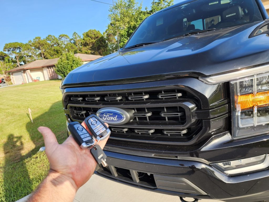 Key-En-Lock locksmith technician working on vehicle lock