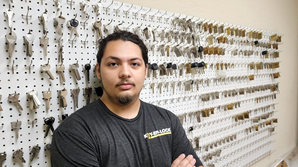 Key-En-Lock residential locksmith installing door lock