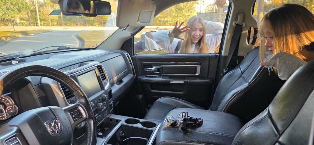 Keys locked inside a Ram truck with someone pressing against the window - Key-En-Lock Locksmith Brevard County FL