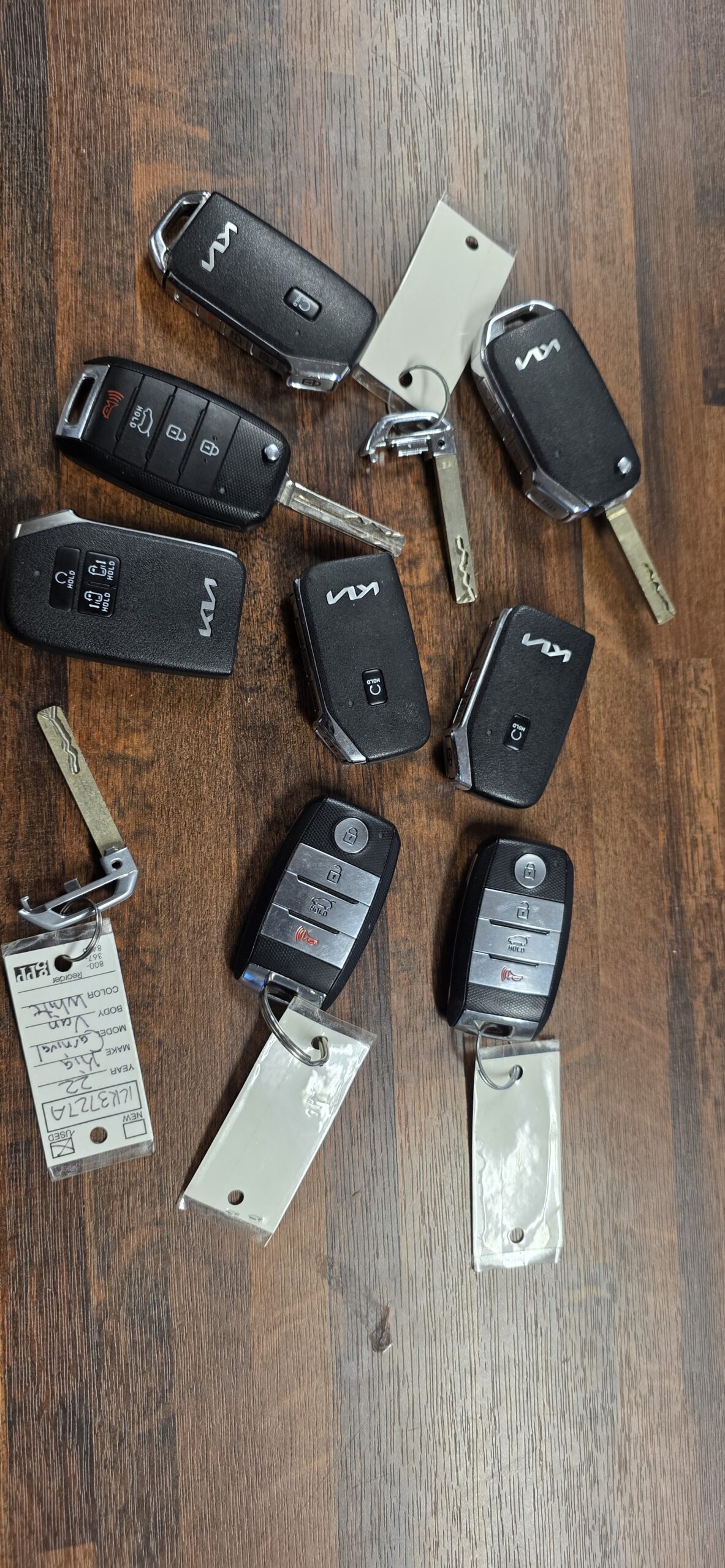 Different types of Kia key fobs side by side