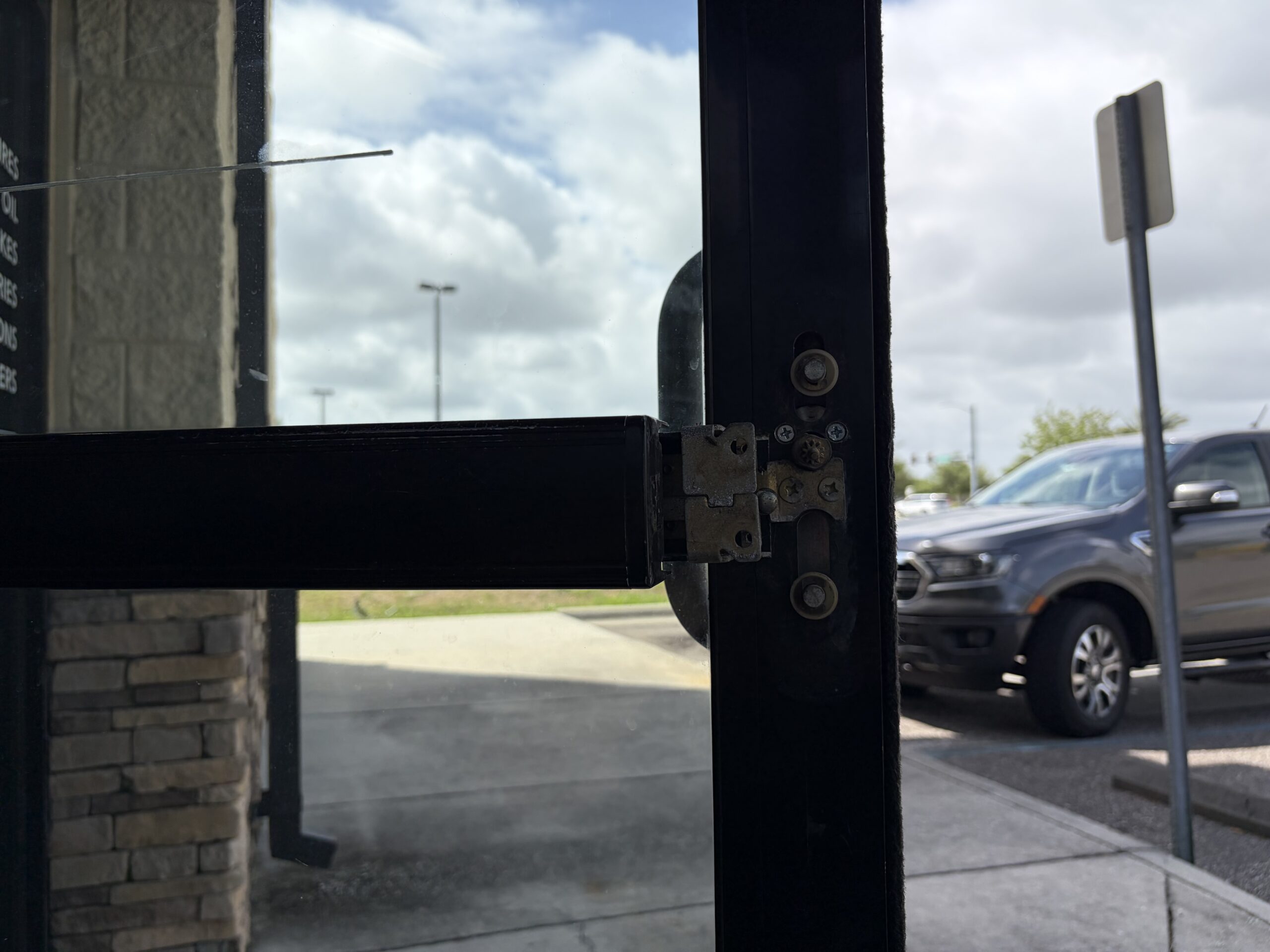 Close up of Dor-O-Matic dogging kit components showing allen key strip wear