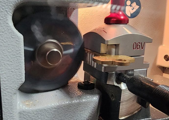 A machine is being used to make a coin.